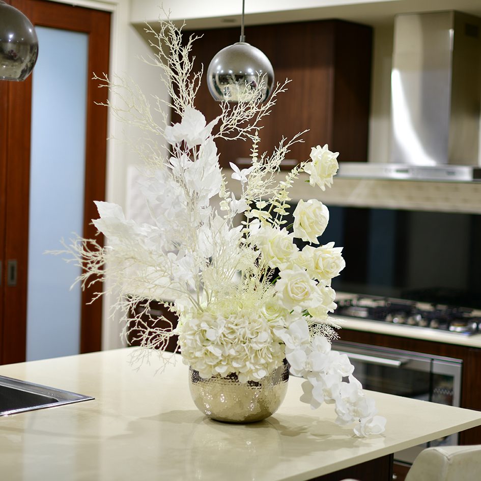Artificial flower arrangement in Silver Vase 