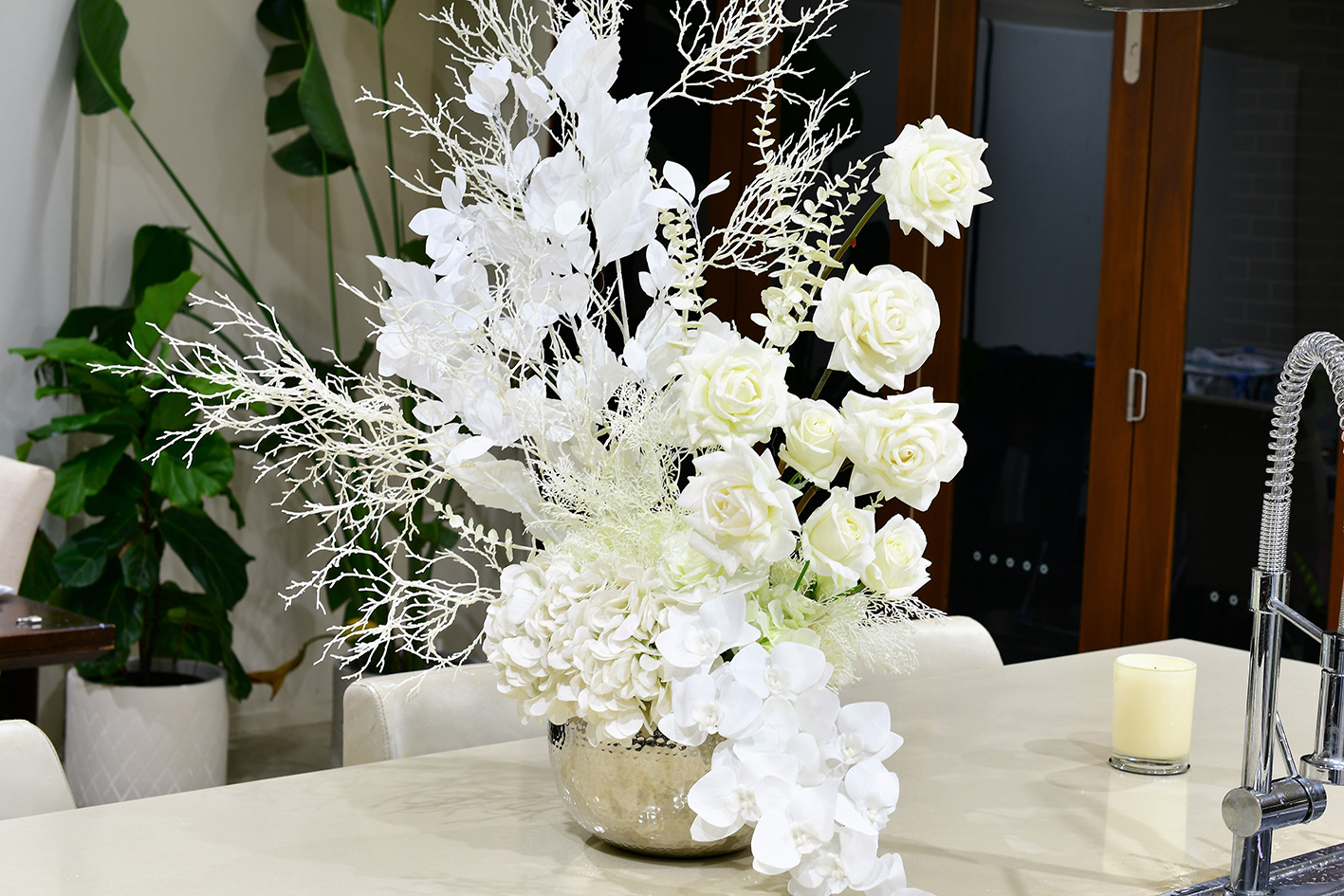 artificial flower arrangements in vase